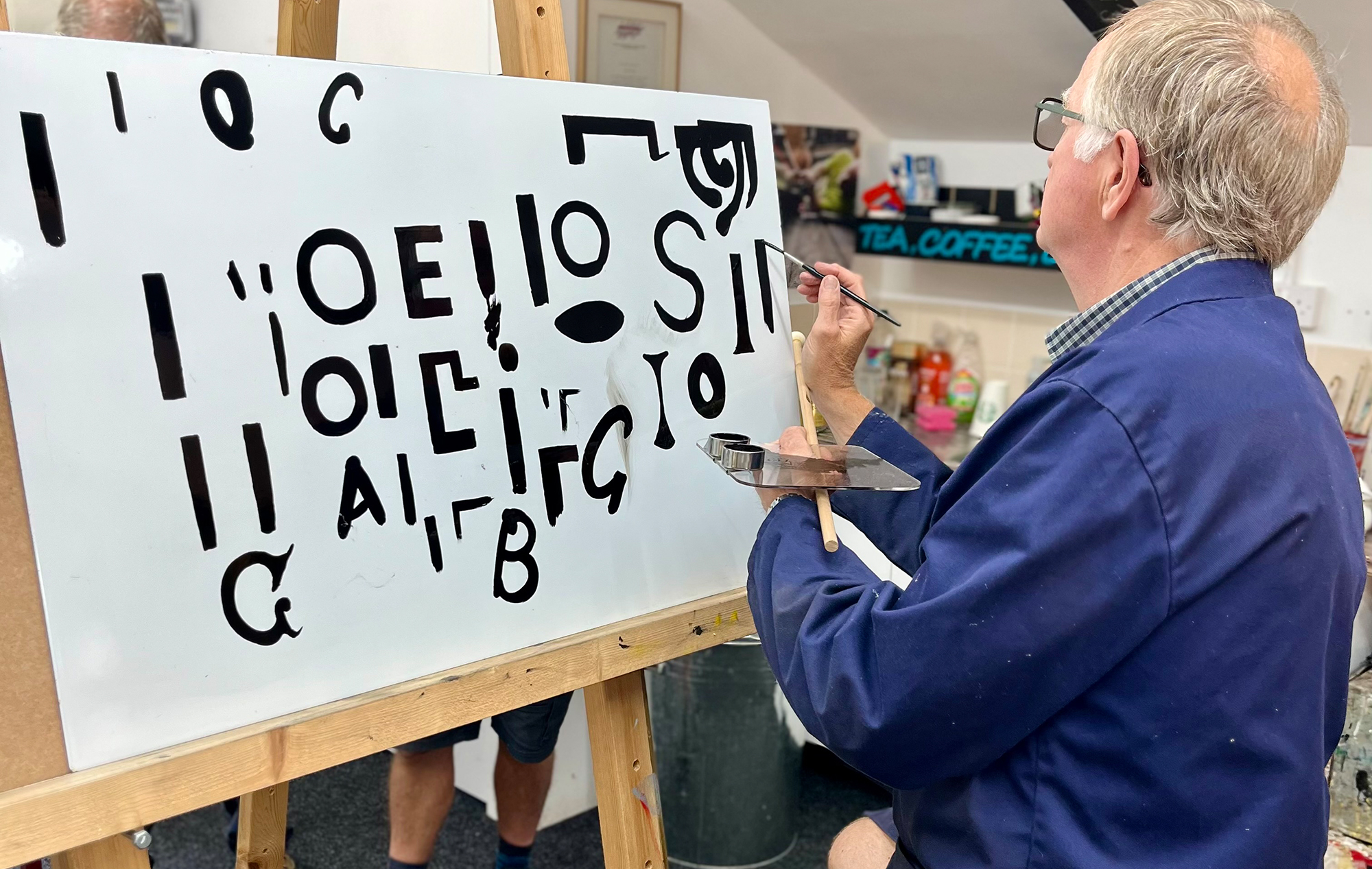 Chris using his father's brushes