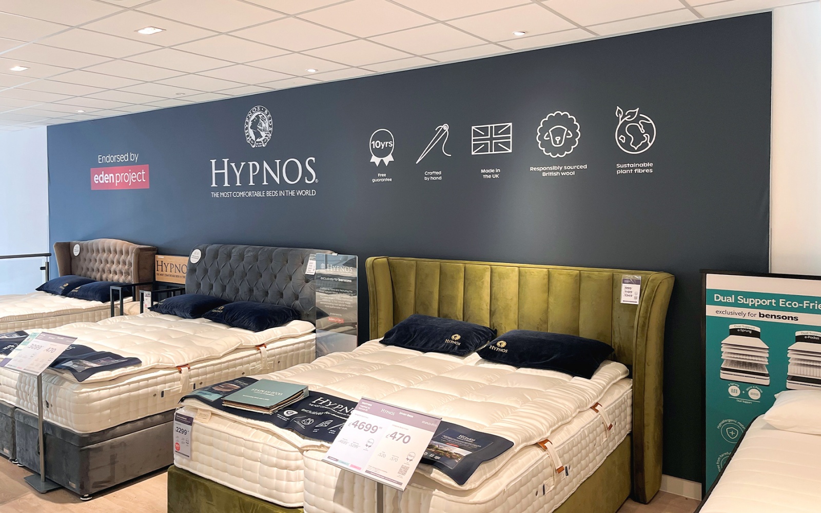 A tension-frame Hypnos graphic in a Bensons store