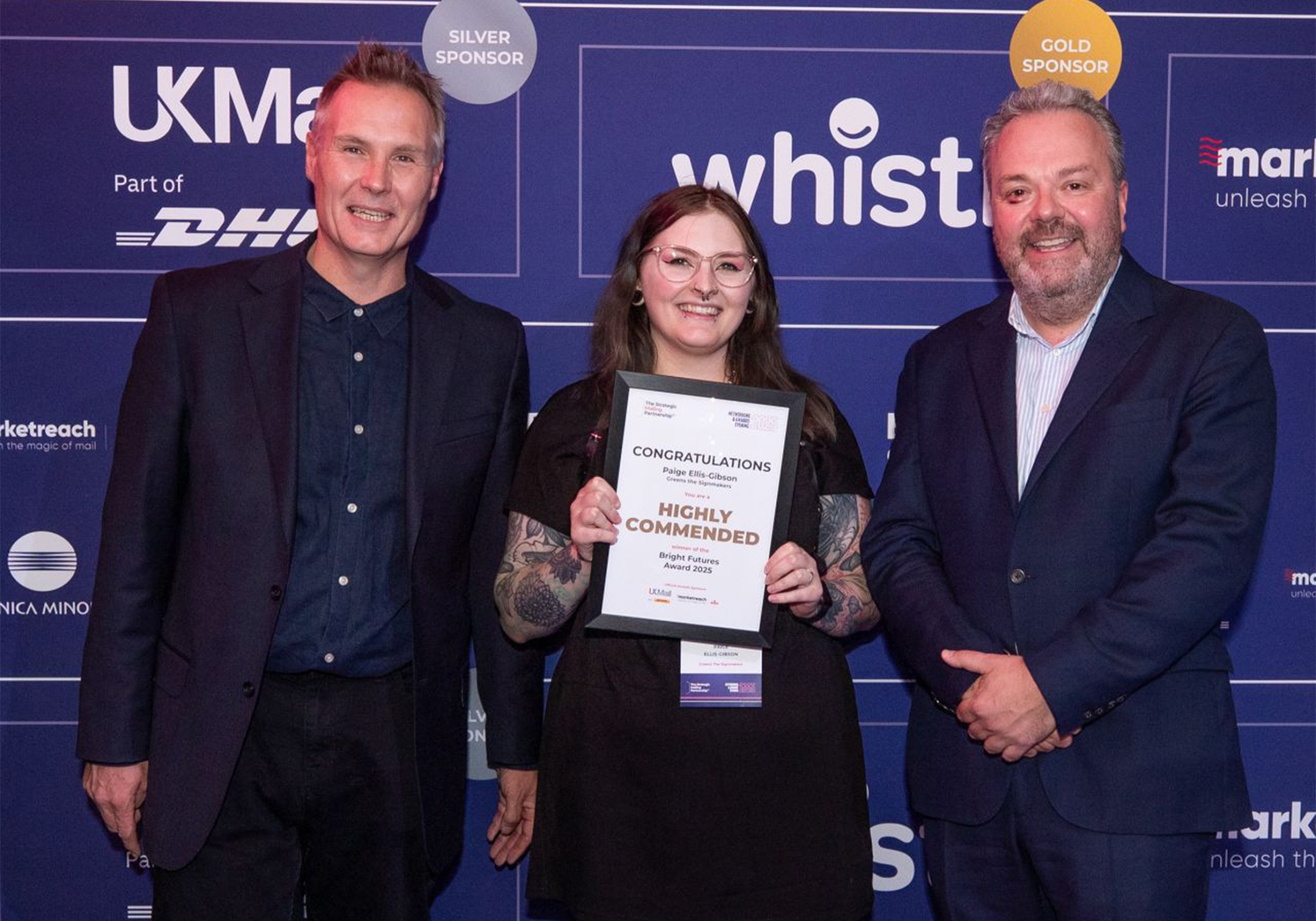 Paige receiving her award.