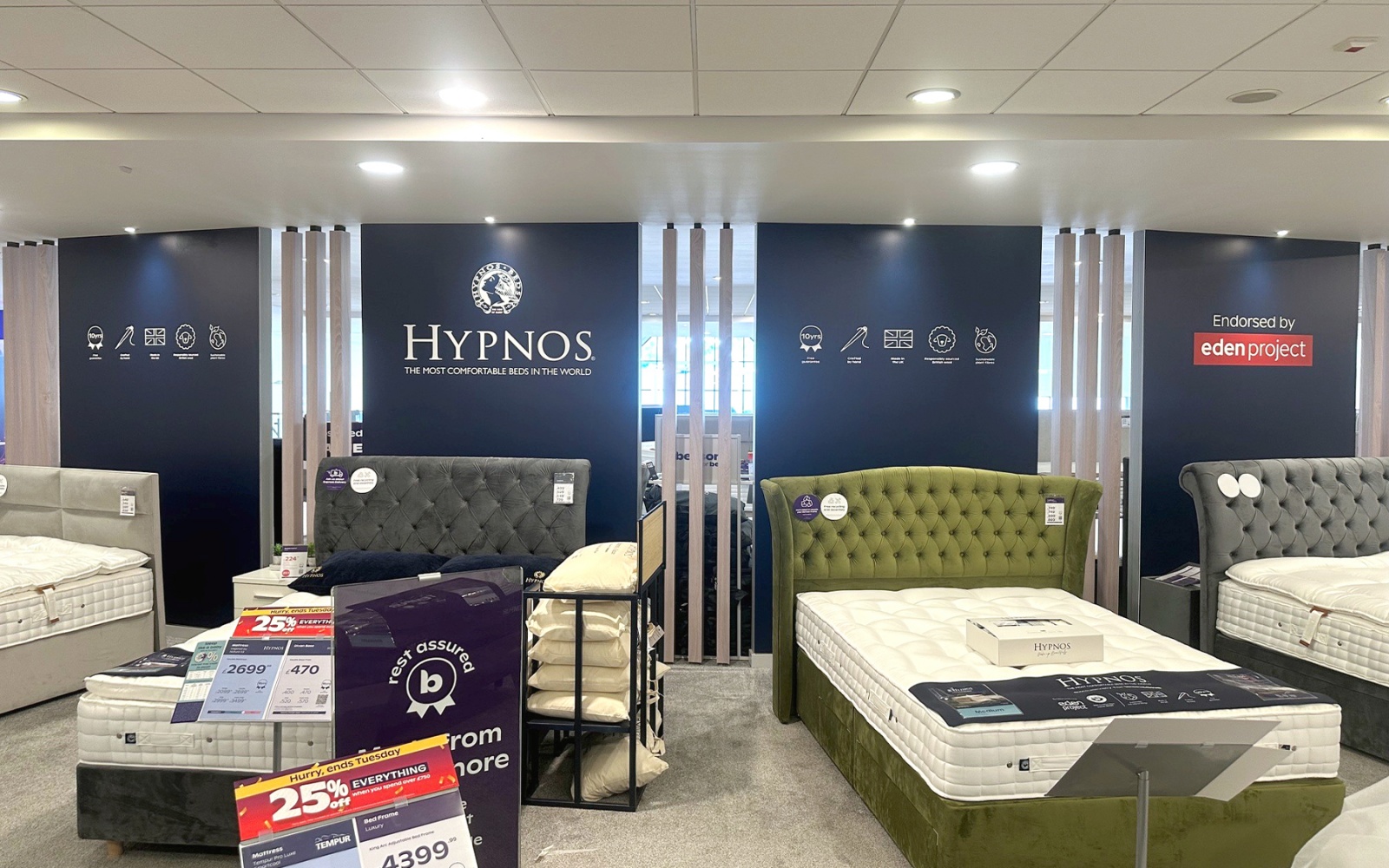 Tension-frame Hypnos graphics in a Bensons store