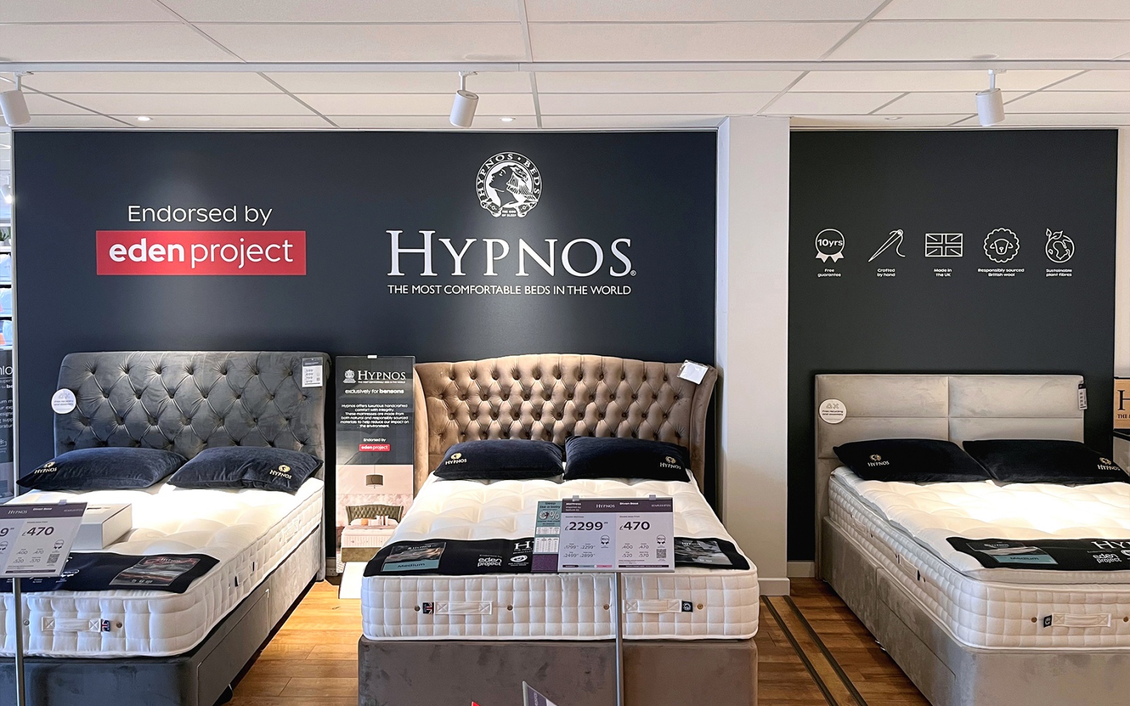 A tension-frame Hypnos graphic in a Bensons store