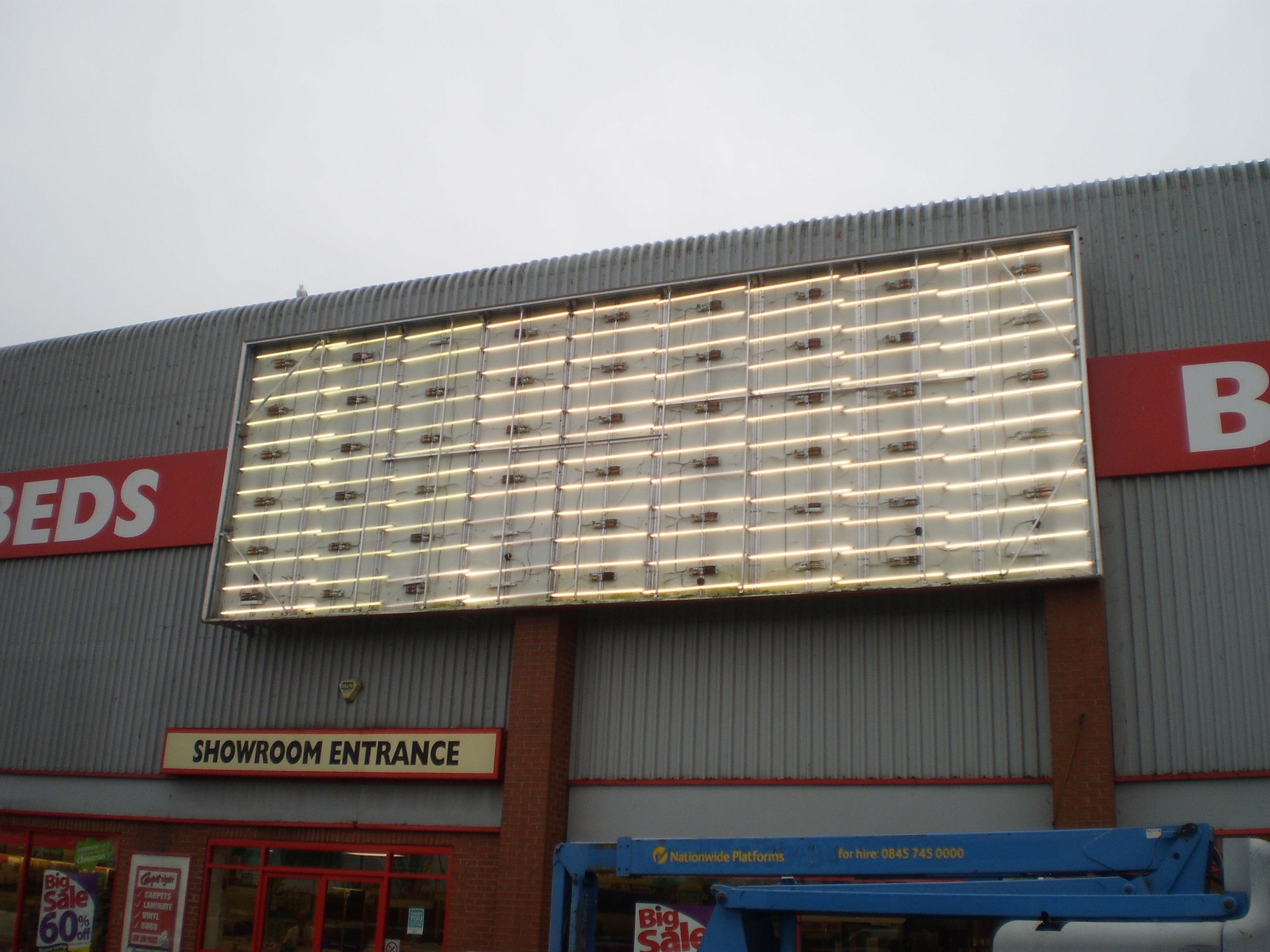 Fluorescent tubes installed in a sign.